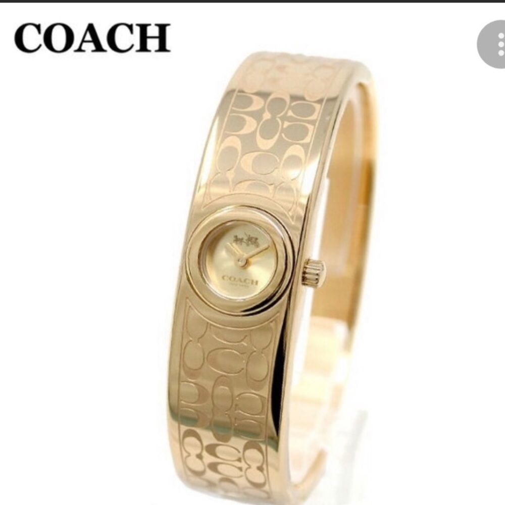 Coach {Scout} gold tone etched signature bangle watch 16mm